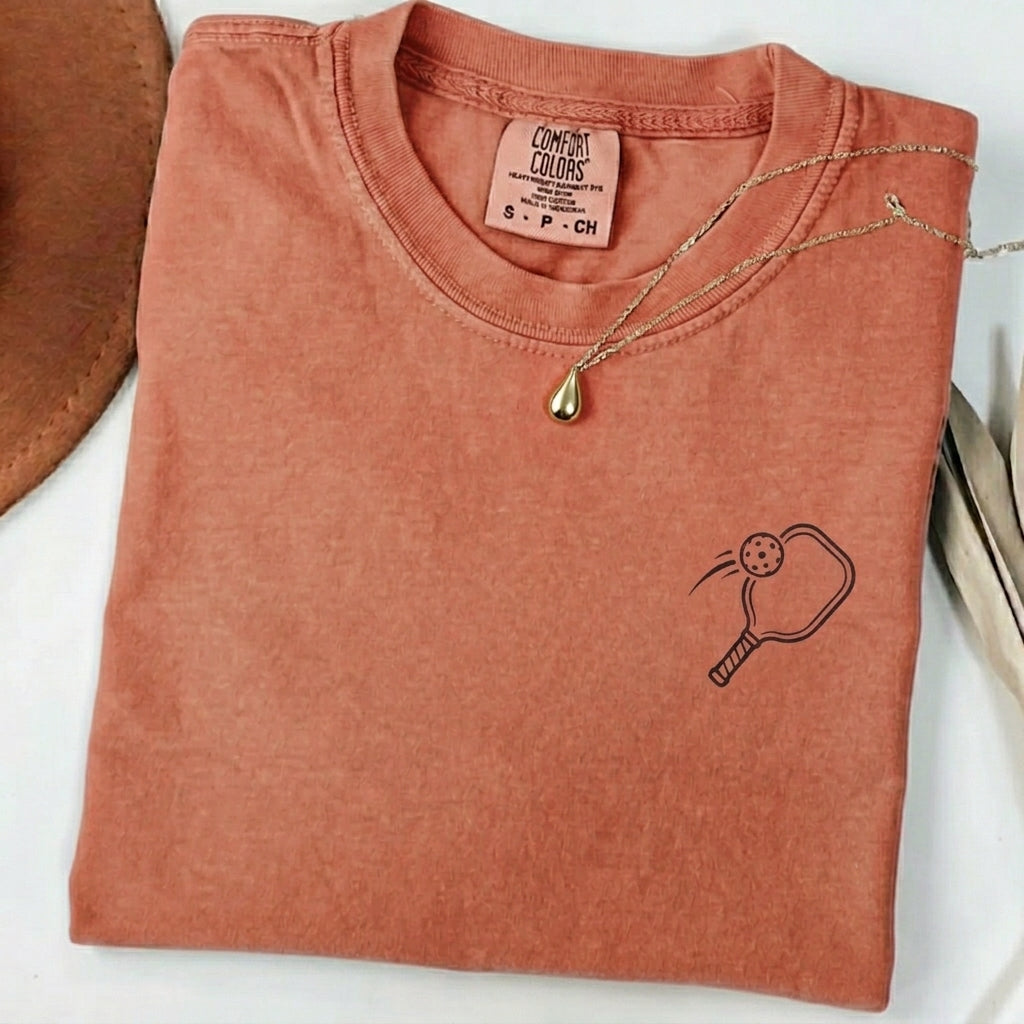 Minimalist Pickleball Paddle t-shirt in Terracotta