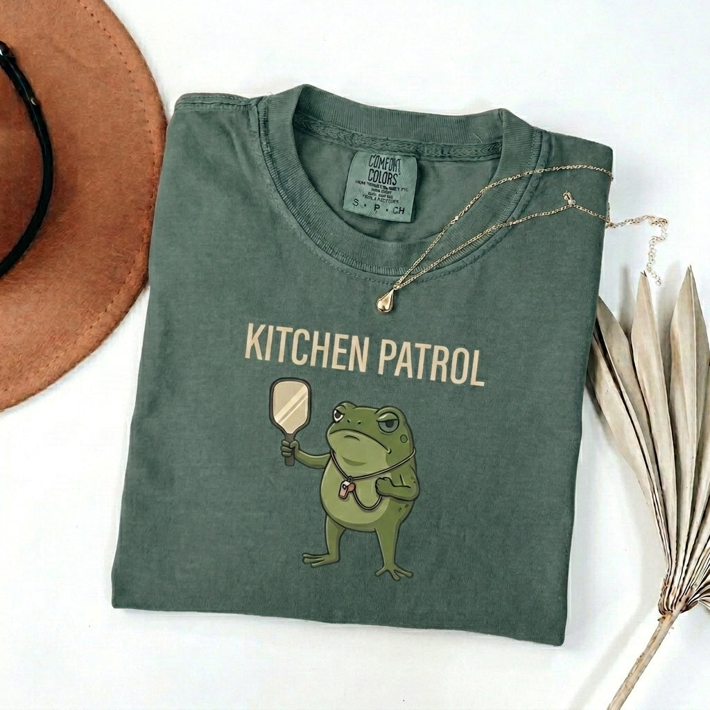 Kitchen Patrol Frog Pickleball t-shirt in Blue Spruce